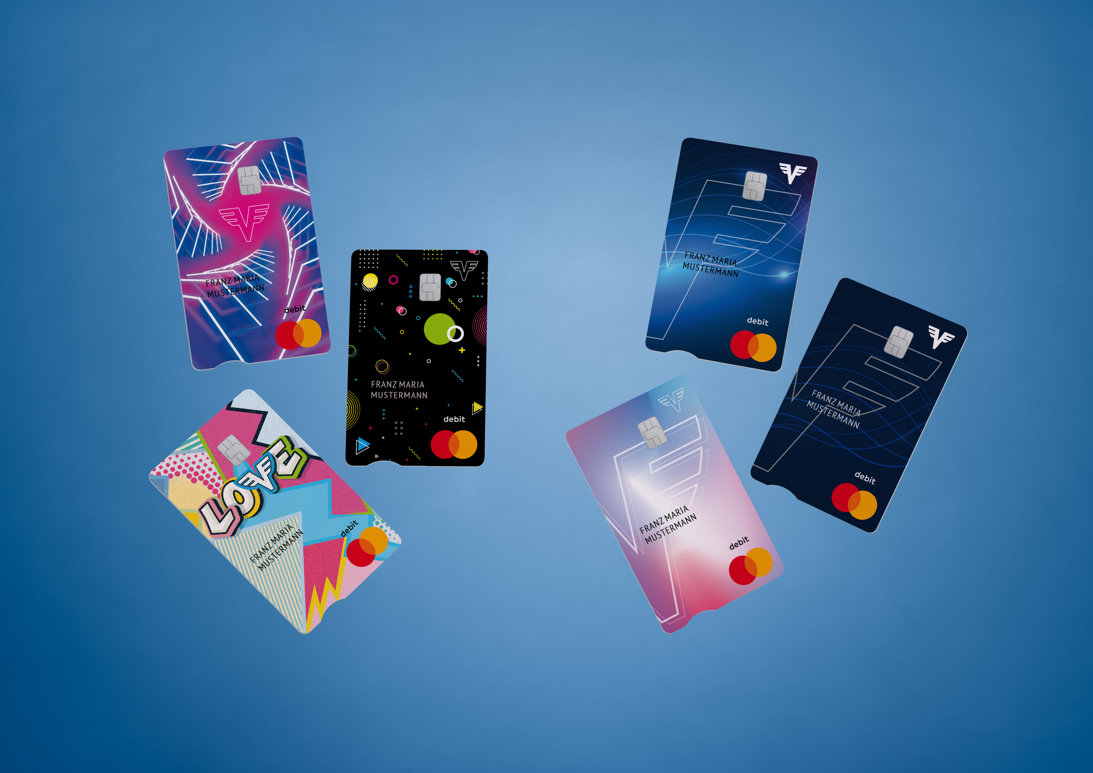 Alle sechs Karten der Volksbank Konten auf blauem Hintergrund.